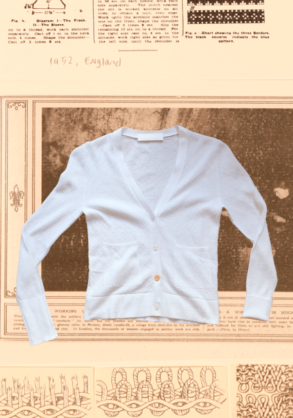 A light blue, V-neck cardigan with a textured knit and button closure, set against a vintage-patterned background.
