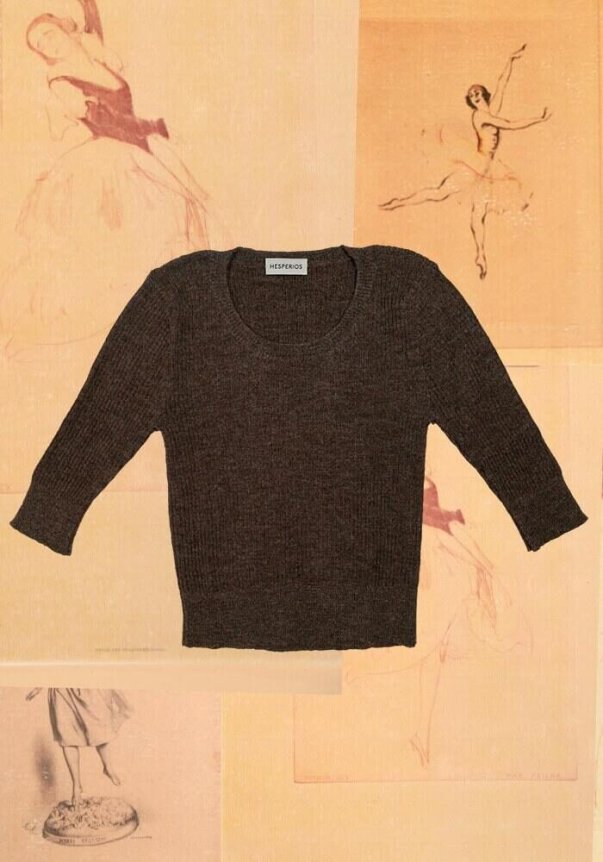 A charcoal gray, ribbed knit sweater with a crew neckline and three-quarter sleeves, set against a vintage ballet-themed background.