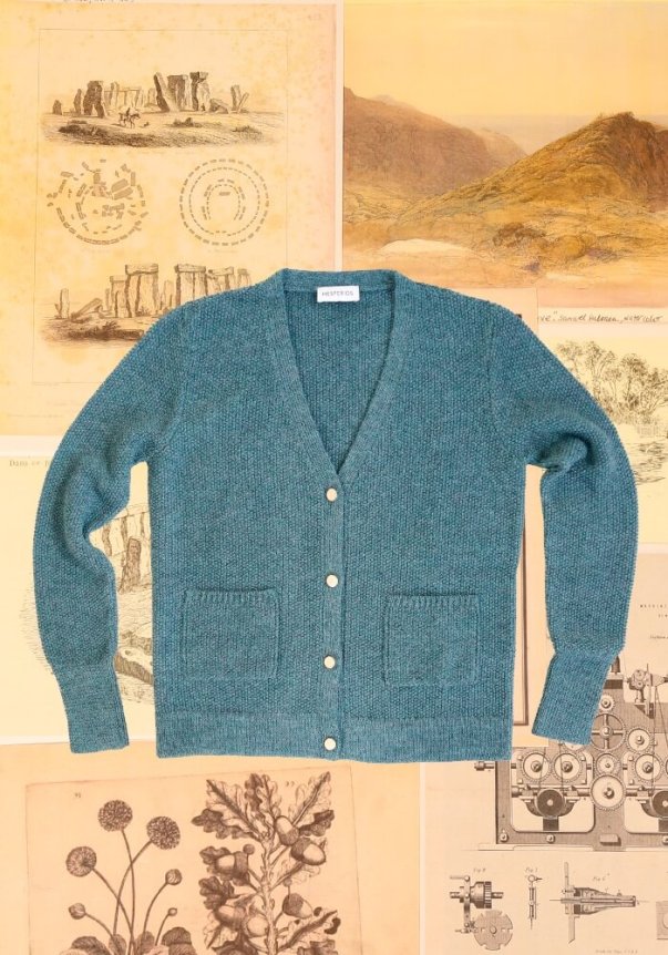 A teal button-up cardigan with a V-neck, front pockets, and a knitted texture, laid on a background of vintage illustrations.