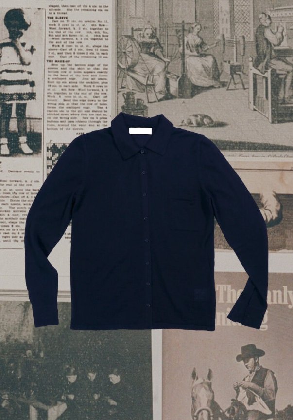 Navy blue button-up cardigan with a classic collar and pocket detail, set against a vintage newspaper collage background.