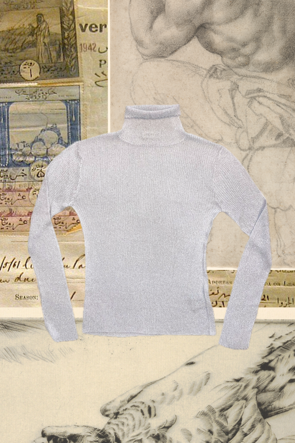 A silver, ribbed, long-sleeve, turtleneck sweater set against a collage of artistic sketches and vintage text.