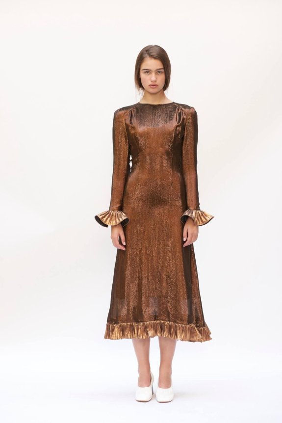 A bronze metallic long-sleeve midi dress with a fitted silhouette, featuring ruffled cuffs and hem details.