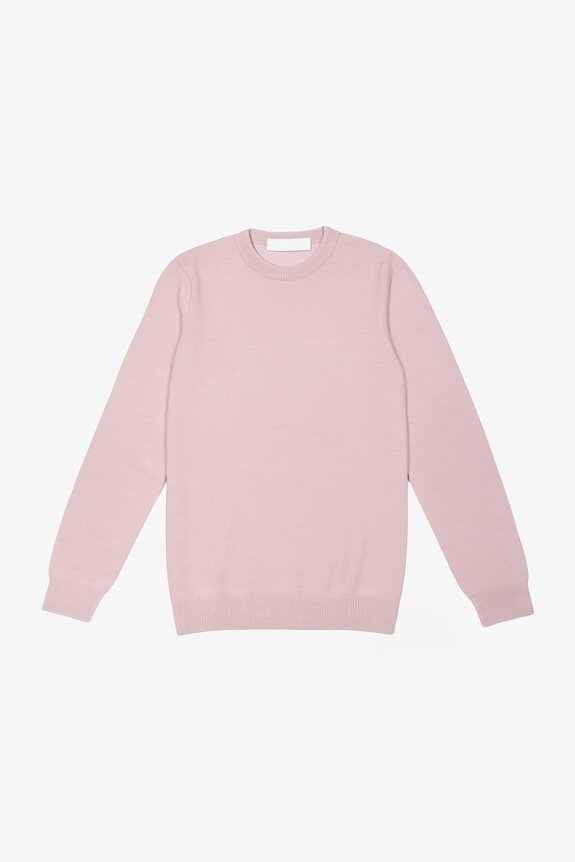 A light pink crew-neck sweater with long sleeves.