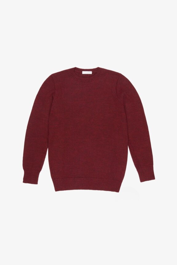 A burgundy crew-neck sweater on a white background.