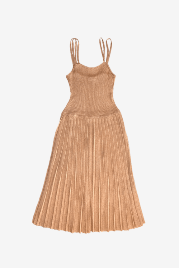 A beige pleated knit dress with spaghetti straps.