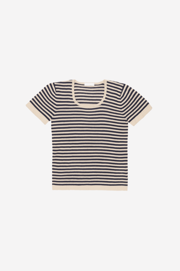 A short-sleeved, navy and cream striped shirt with a scoop neckline.