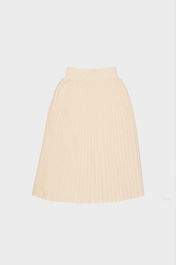 A cream-colored, pleated knit skirt on a plain background.