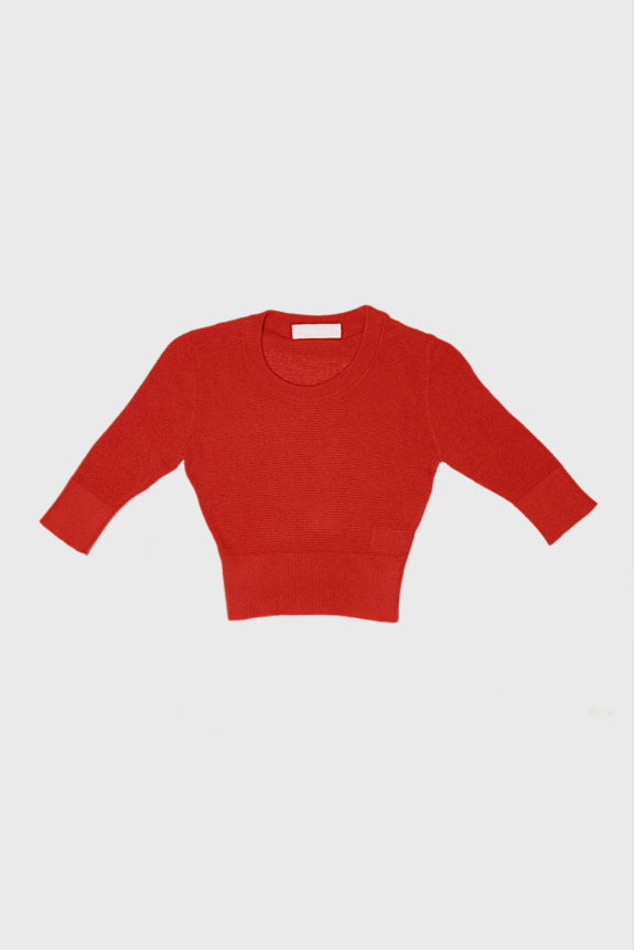 A red cropped long-sleeve sweater on a white background.