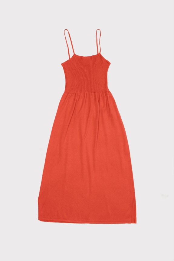 A sleeveless orange dress with thin straps.