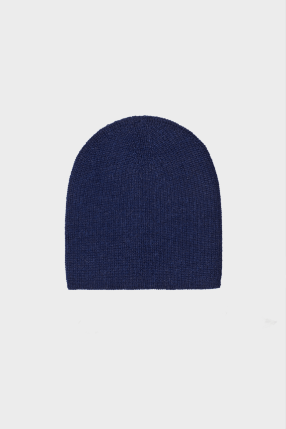 A blue knitted beanie against a plain white background.