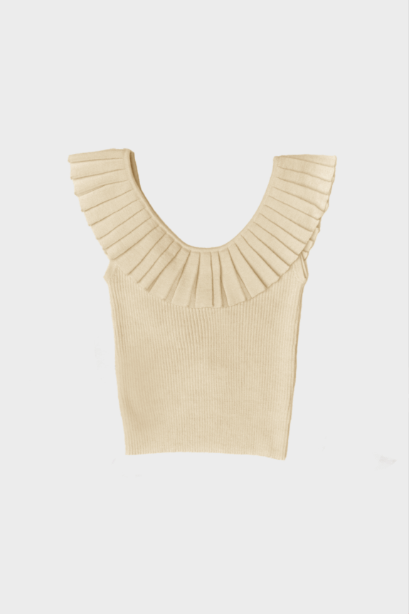 Cream ribbed top with pleated ruffle sleeves.