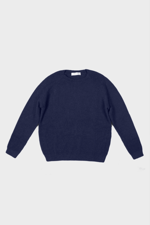 A navy blue crewneck sweater is laid flat on a plain background.