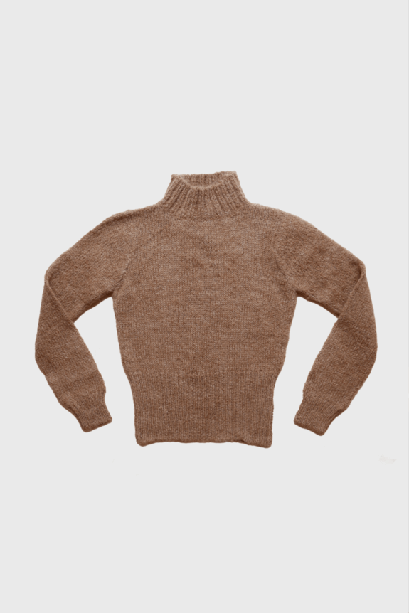 A brown knitted turtleneck sweater on a plain background.