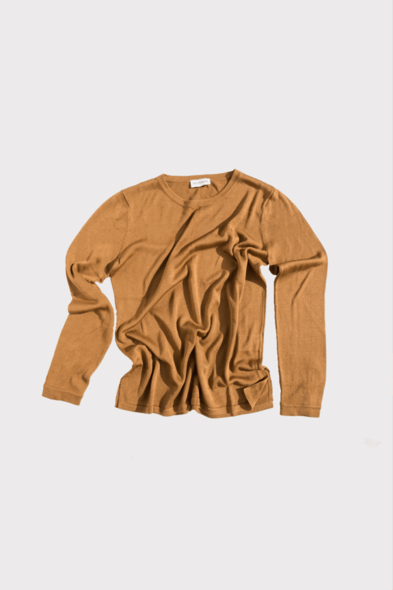 A brown long-sleeve shirt with wrinkles, laid flat on a white background.