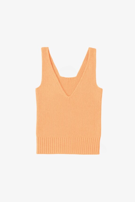 A ribbed, V-neck, sleeveless beige knit top on a white background.
