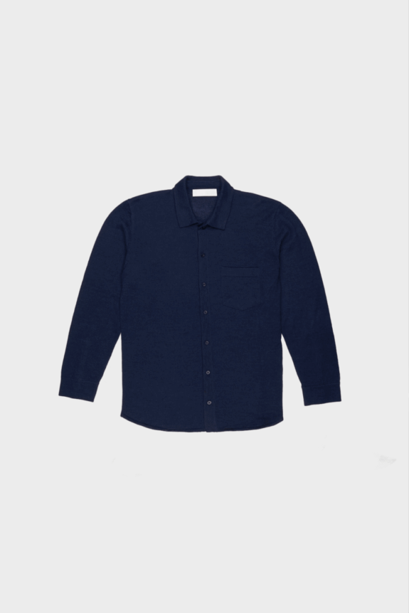 A navy blue long-sleeve button-up shirt with a front pocket on a white background.