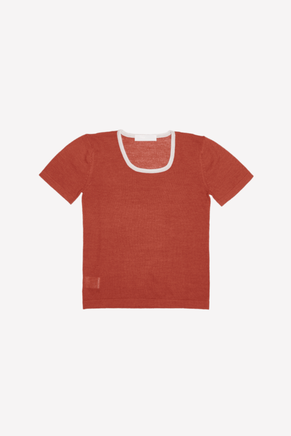 A red short-sleeve shirt with a white-trimmed scoop neckline.