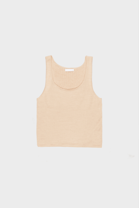 A beige sleeveless tank top with a textured neckline.